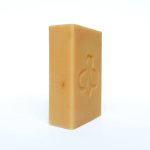 Sunshine soap, with Yellow Clay and Calendula Petals - Elegant and angled presentation of our soap featuring a soft, natural colour from yellow clay with speckles of calendula petals.