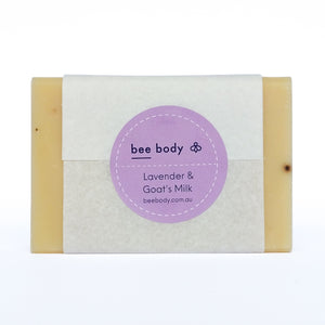 Packaged Lavender and Goat’s Milk Soap - Wrapped in white tissue paper with a soft purple sticker.